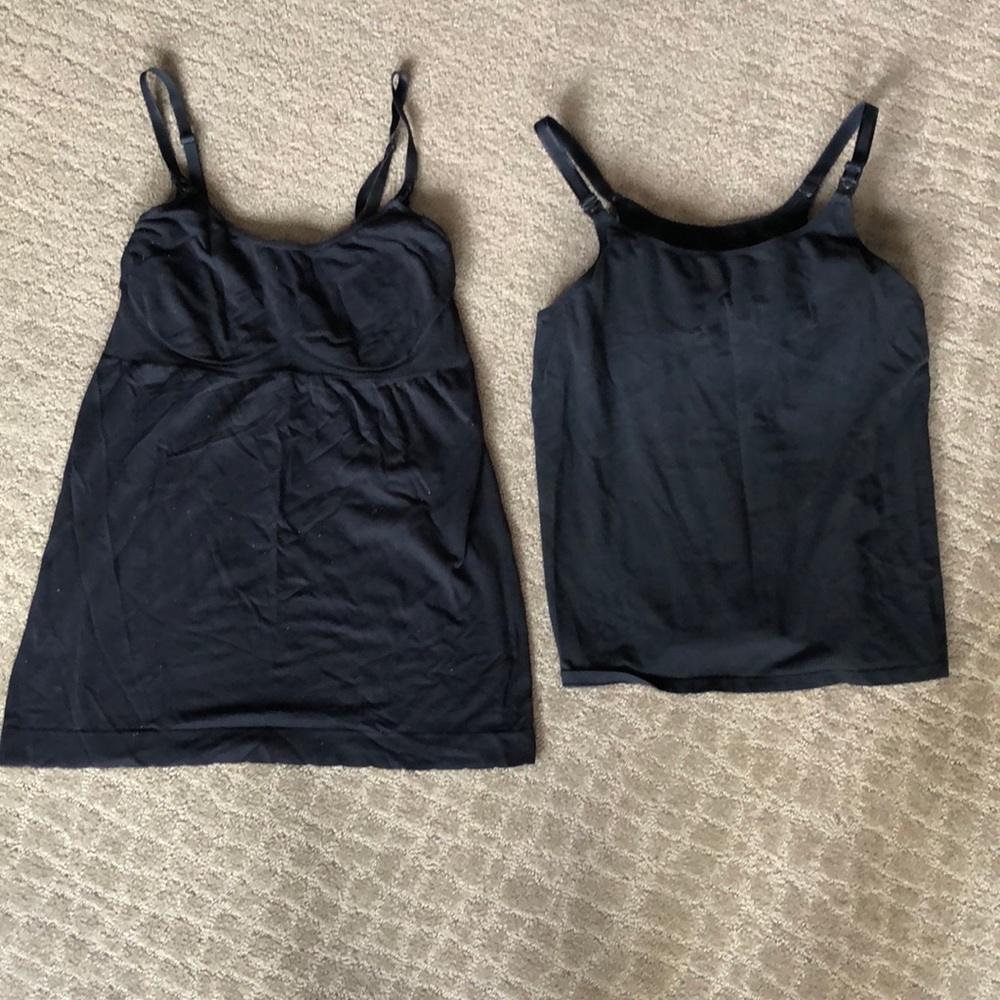 Two black nursing tanks